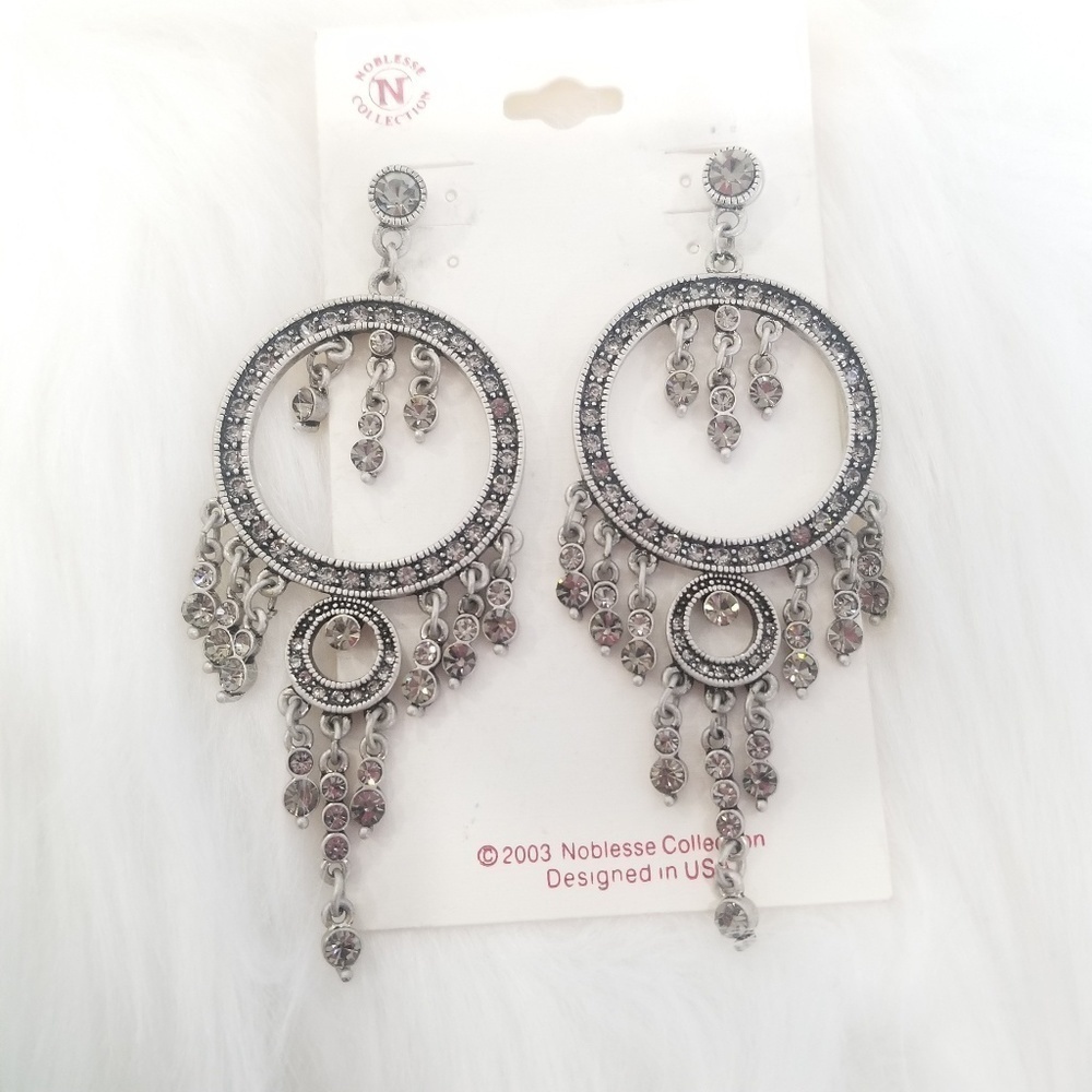Silver dangling circle earrings